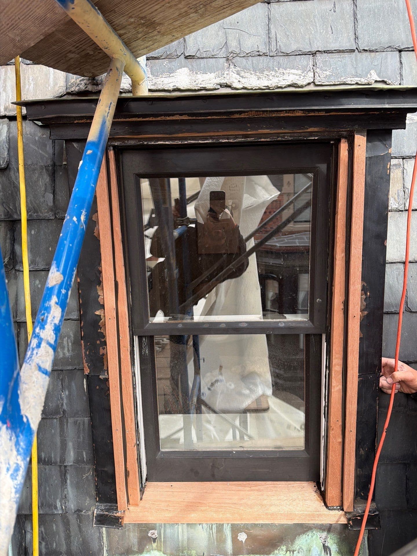 Project Mahogany Window Trim Installation by Fairway Roofing and Maintenance image