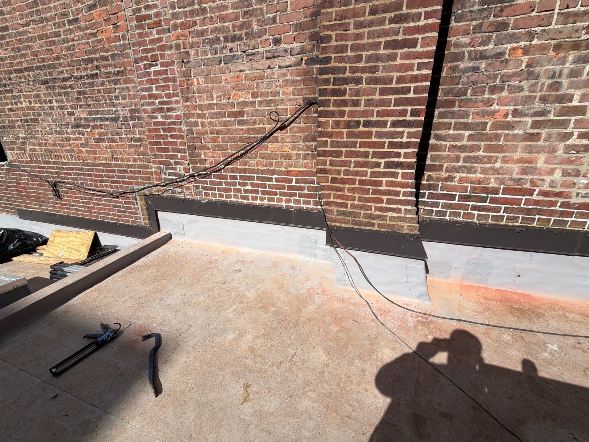 Project Dark Bronze Metal Installation on Boston's TPO Roof image