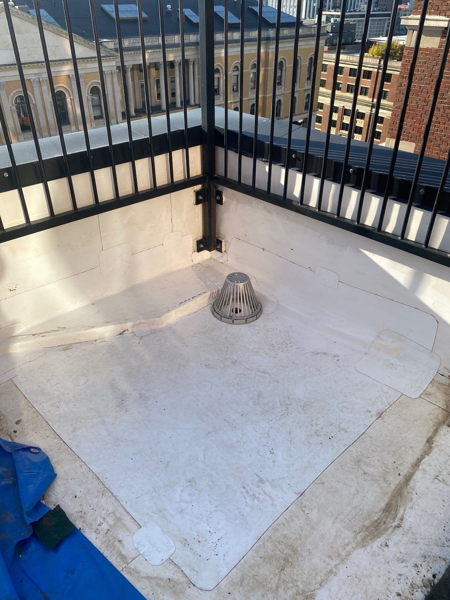 Expert Roofing in Downtown Boston with New Drain Installations image