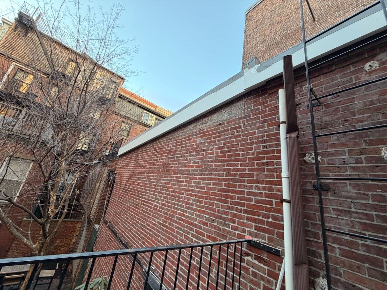 Project New TPO Membrane Roof Installation on Urban Buildings in Boston image