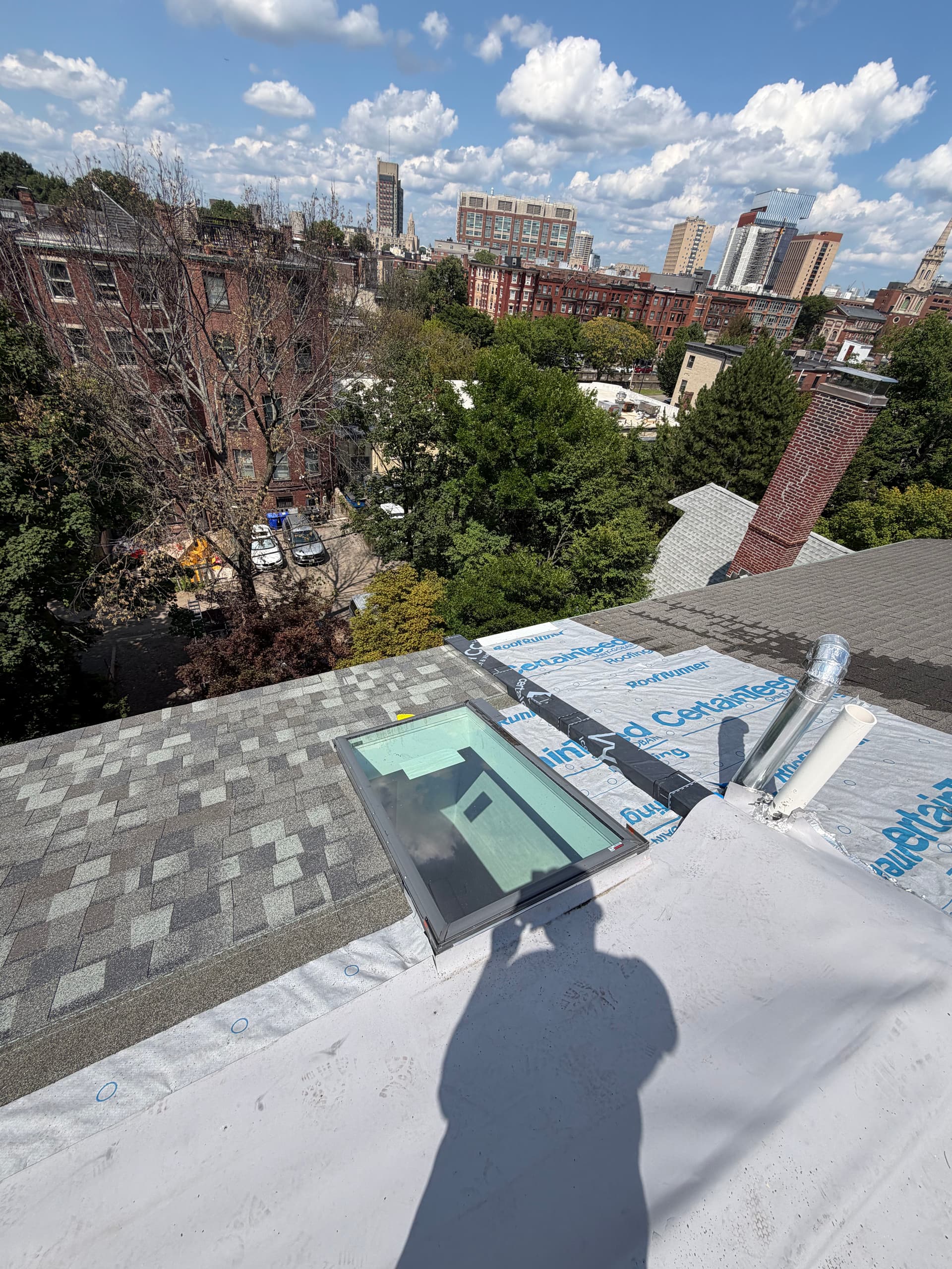 Gallery photos for Clean Shingle-to-Membrane Transition With New Skylight Installation: Image #1