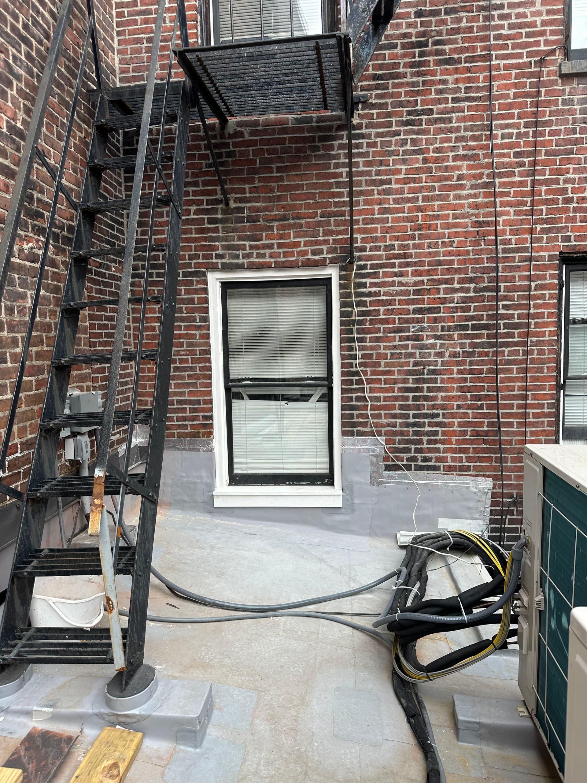 Gallery photos for New TPO Roof and PVC Window Trim in Boston: Image #1